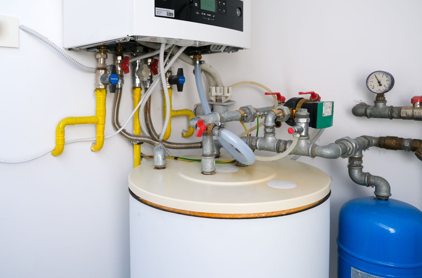 Tank and pipework, illustrating Water Heater Installation in Cumberland County, ME by Wanda’s Water Heaters.